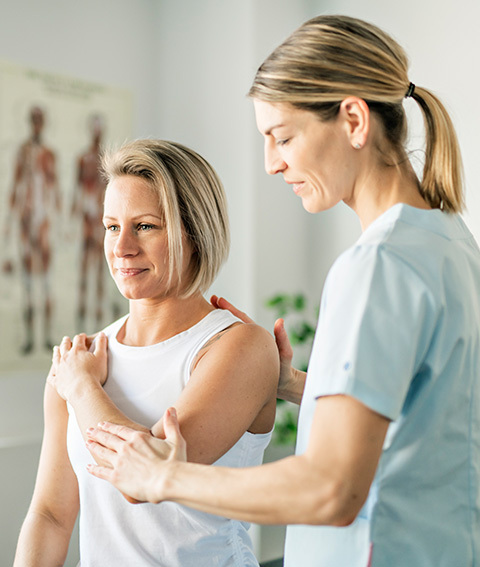 Physiotherapist and client Physiotherapist and client