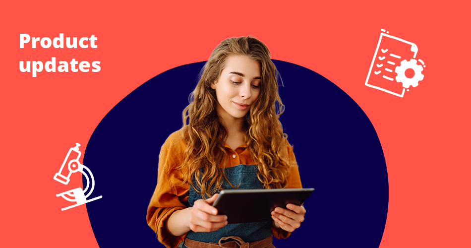 Woman in apron looking at tablet