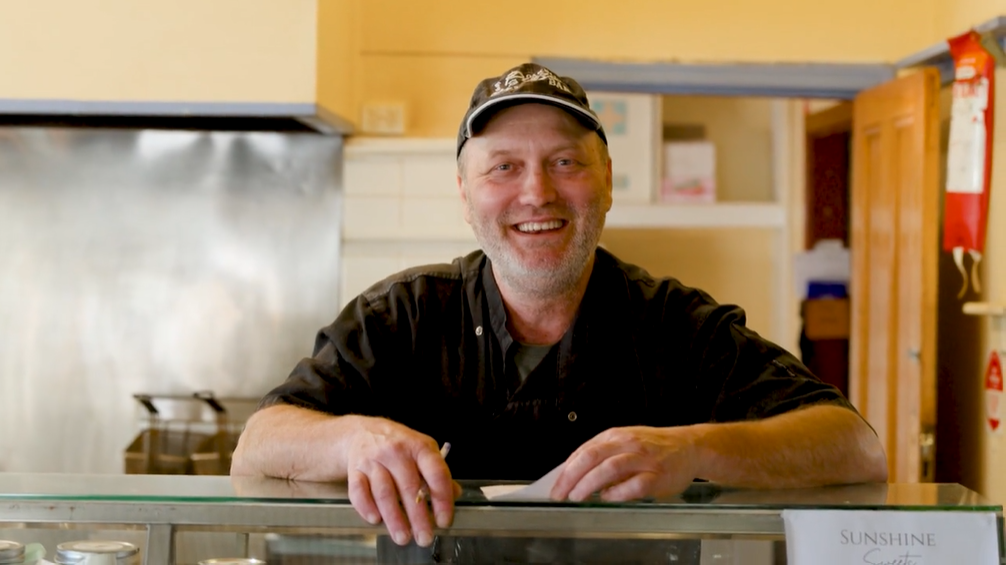 Errol At Counter Toy library aisle