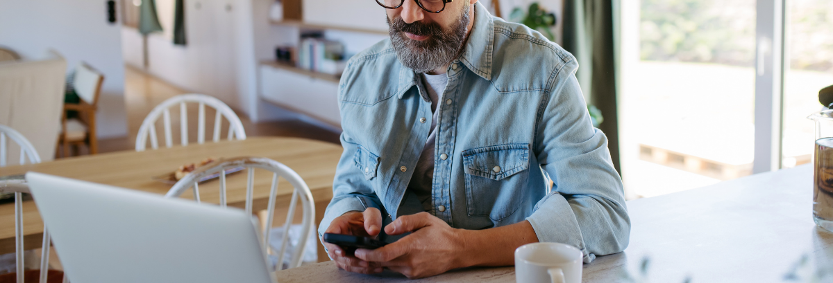 man looking at computer