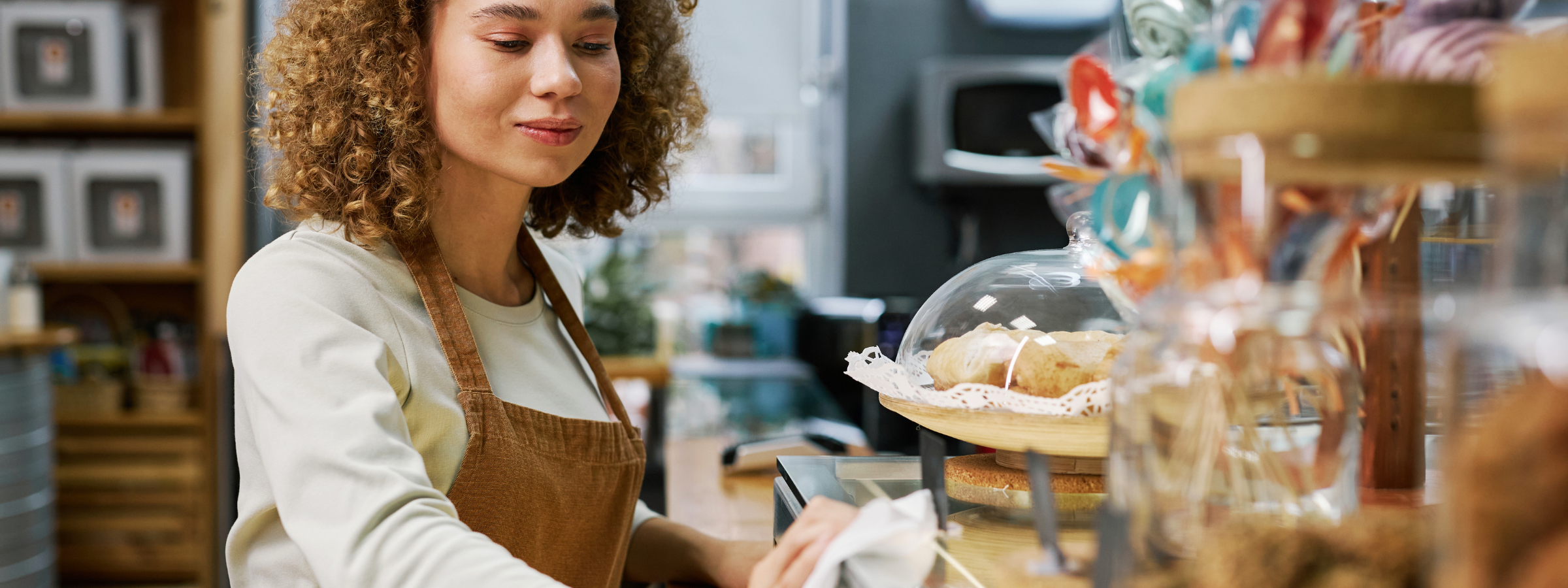Invoice Payment Terms Small Businesses Should Know Shopkeeper stocking shelves